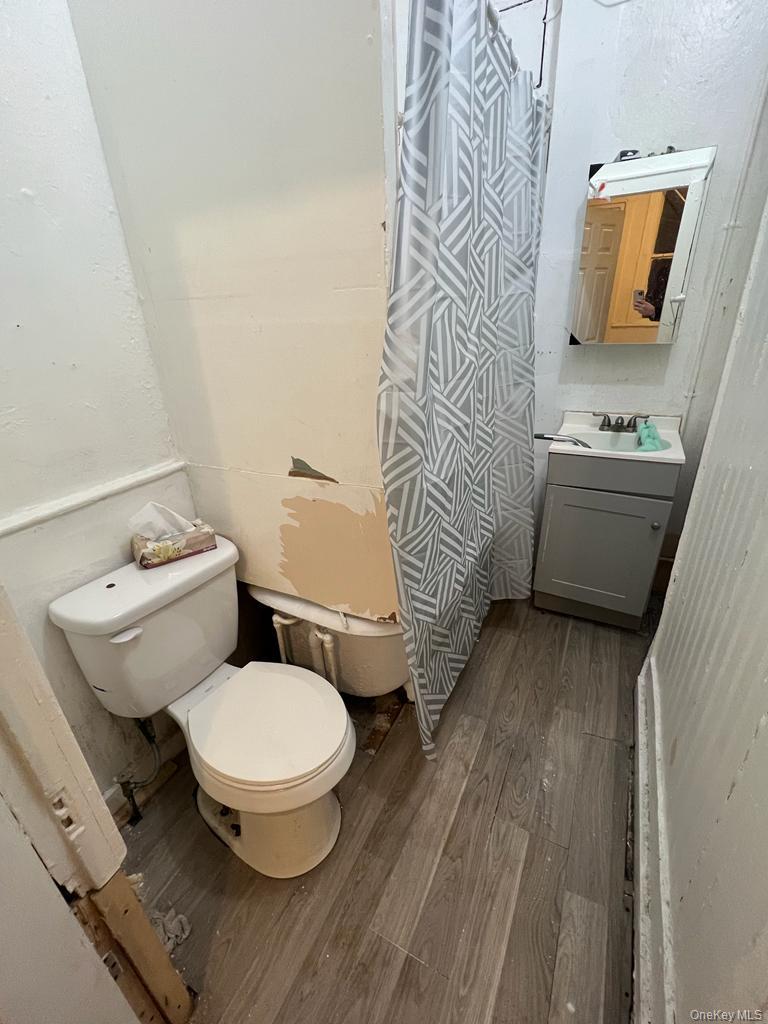 119 Chambers Street Newburgh, NY 12550 - Photo 15 of 18 a bathroom with a toilet and a sink