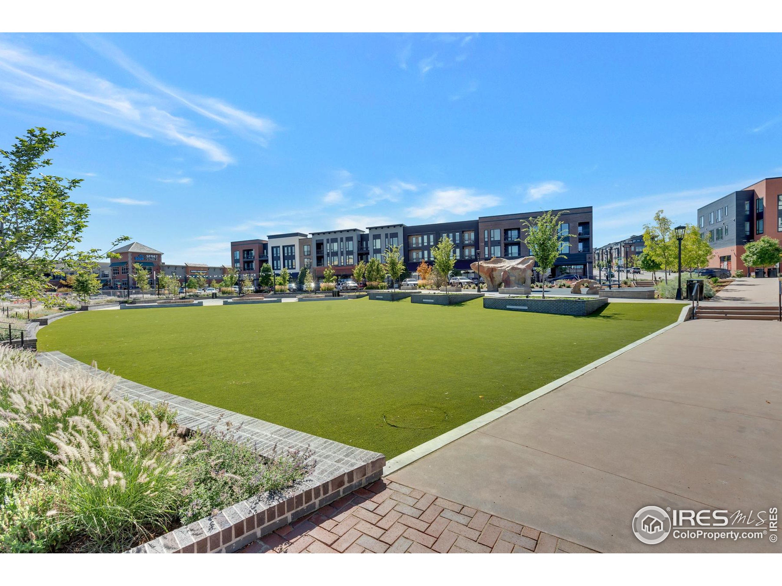 352 Marshall Road Superior, CO 80027 - Photo 29 of 30 a view of a swimming pool with an outdoor space and seating area