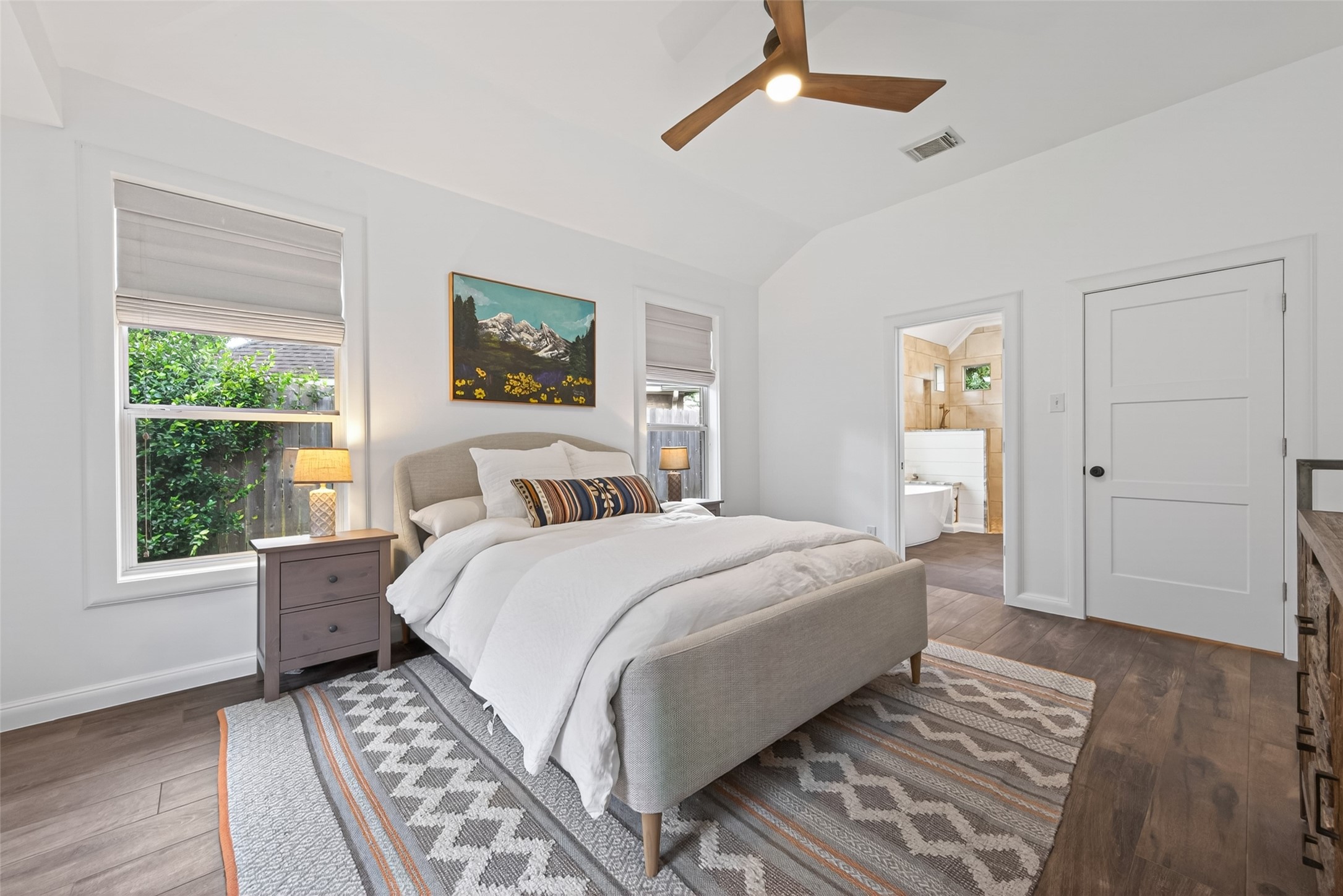 10 Belcarra Place Spring, TX 77382 - Photo 49 of 49 Very spacious primary bedroom. Lots of windows. Split bedroom floor plan for privacy. A truly, peaceful retreat!