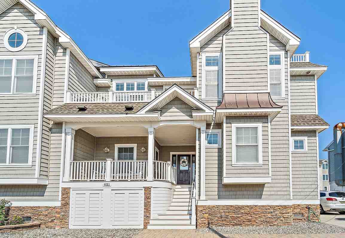 8311 3rd Avenue, Unit NORTH Stone Harbor, NJ 08247 - Photo 1 of 1 a view of a house with a iron gate