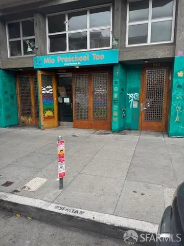 a front view of a building with glass windows