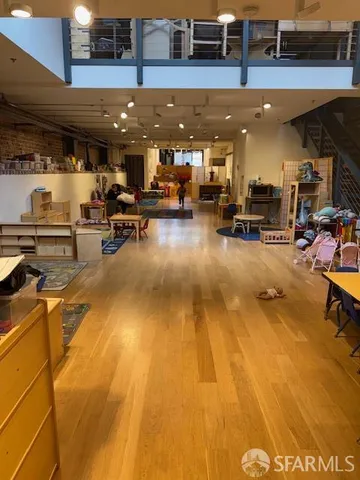 a view of a gym with equipment