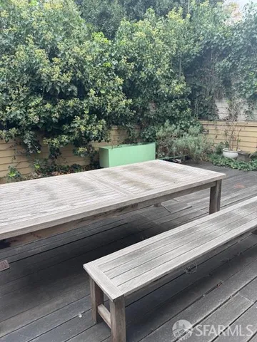a view of backyard and wooden floor