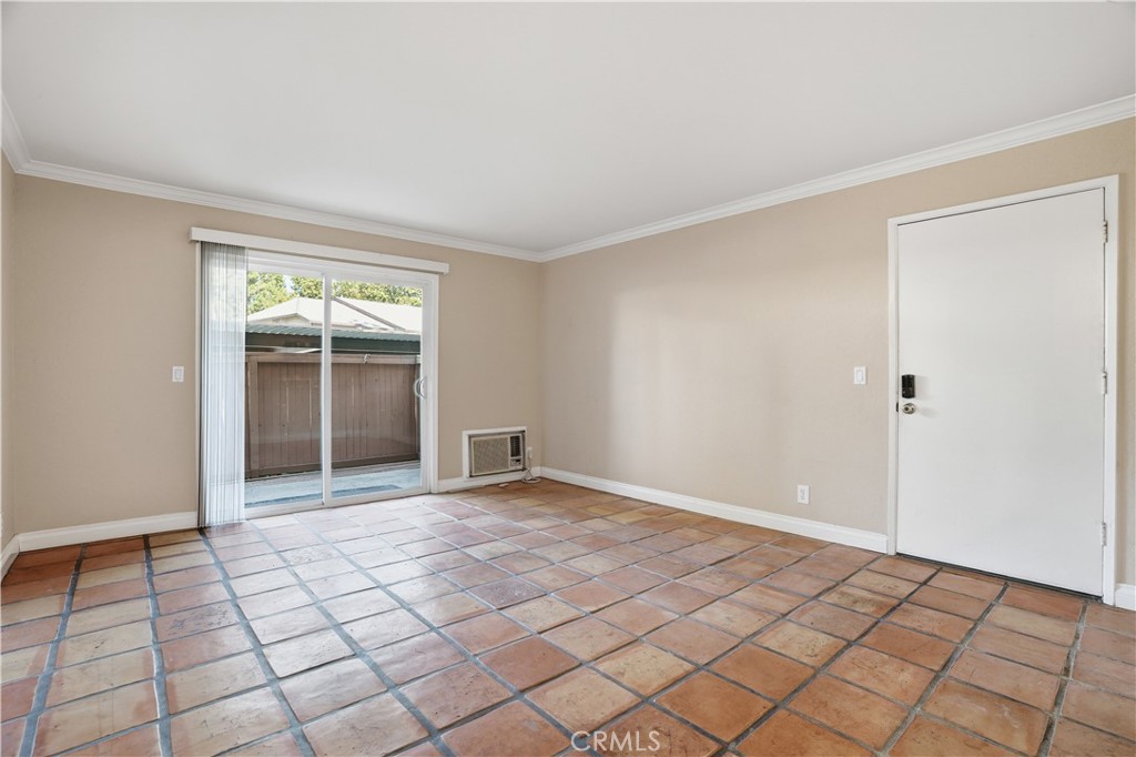 20702 El Toro Road, Unit 231 Lake Forest, CA 92630 - Photo 6 of 36 a view of an empty room and window