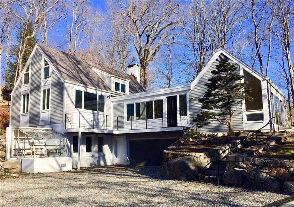 352 Florida Hill Road Ridgefield, CT 06877 - Photo 1 of 1 a front view of a house with a yard