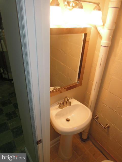 1915 Swansea Road Baltimore, MD 21239 - Photo 27 of 30 Lower Level Half Bath