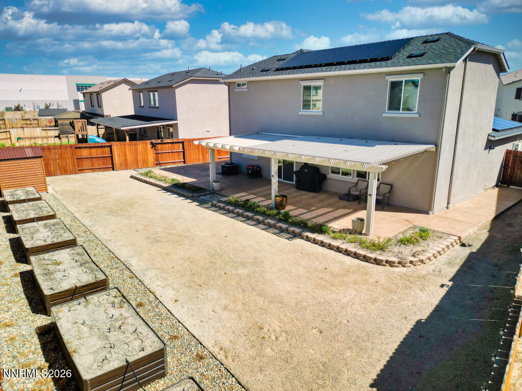 8957 Buffalo Grove Drive Reno, NV 89506 - Photo 51 of 59 a view of a house with swimming pool
