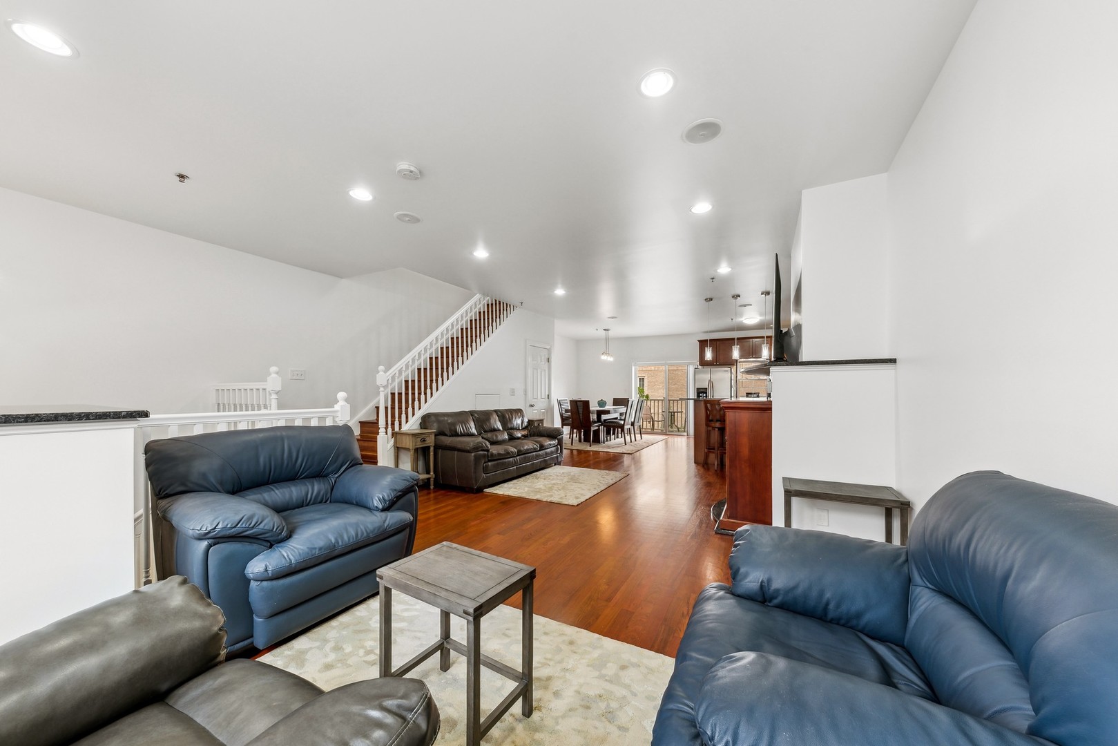 183 East River Road, Unit D2 Des Plaines, IL 60016 - Photo 14 of 42 a living room with furniture and kitchen view