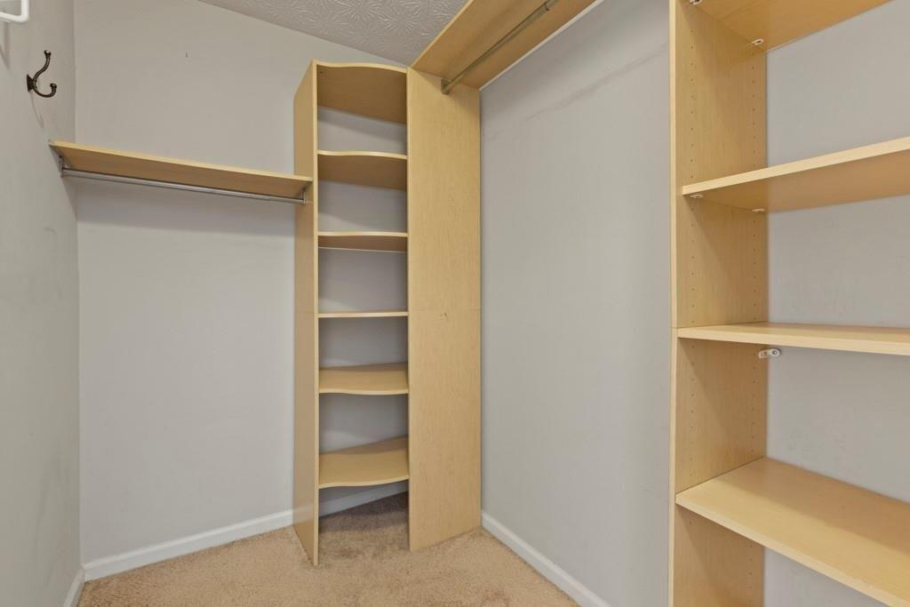 970 Sidney Marcus Boulevard Northeast, Unit 2408 Atlanta, GA 30324 - Photo 16 of 27 a view of an empty walk in closet