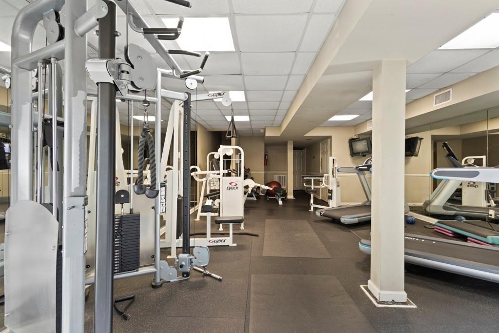 970 Sidney Marcus Boulevard Northeast, Unit 2408 Atlanta, GA 30324 - Photo 26 of 27 a view of a room with gym equipment