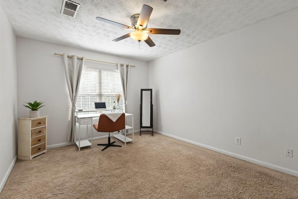 970 Sidney Marcus Boulevard Northeast, Unit 2408 Atlanta, GA 30324 - Photo 10 of 27 a workspace with furniture and window