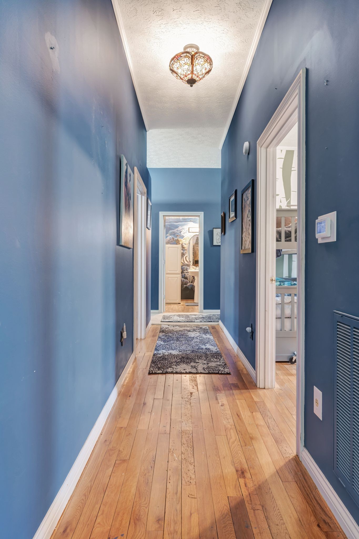 1005 Les Brown Road Bethpage, TN 37022 - Photo 16 of 57 a view of a hallway with wooden floor and staircase