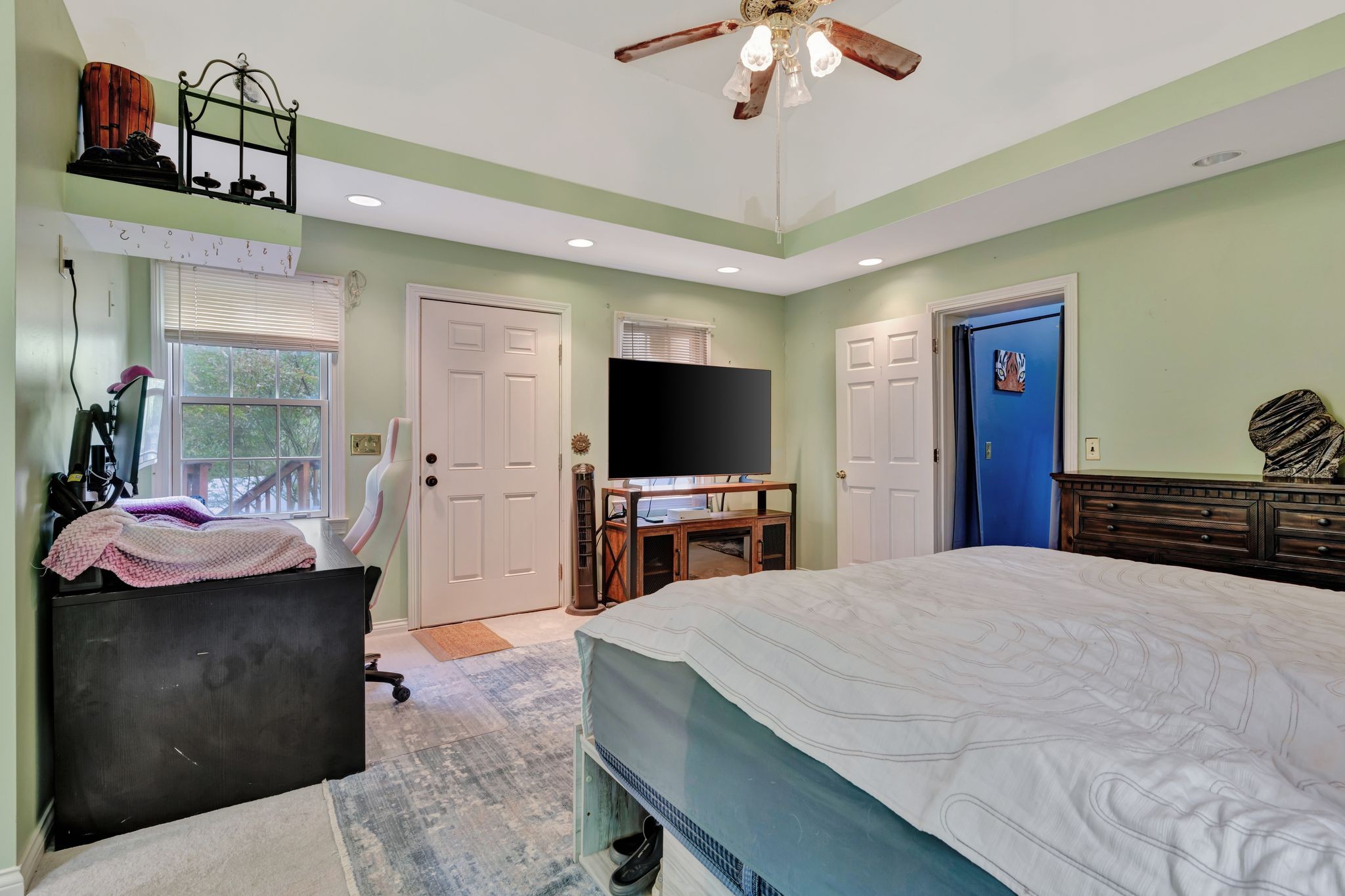 1005 Les Brown Road Bethpage, TN 37022 - Photo 25 of 57 a bedroom with a bed and a flat screen tv