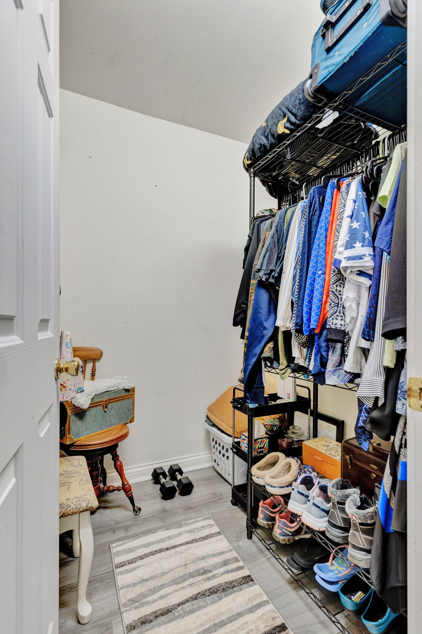 1005 Les Brown Road Bethpage, TN 37022 - Photo 27 of 57 a view of walk in closet with clothes and shoes