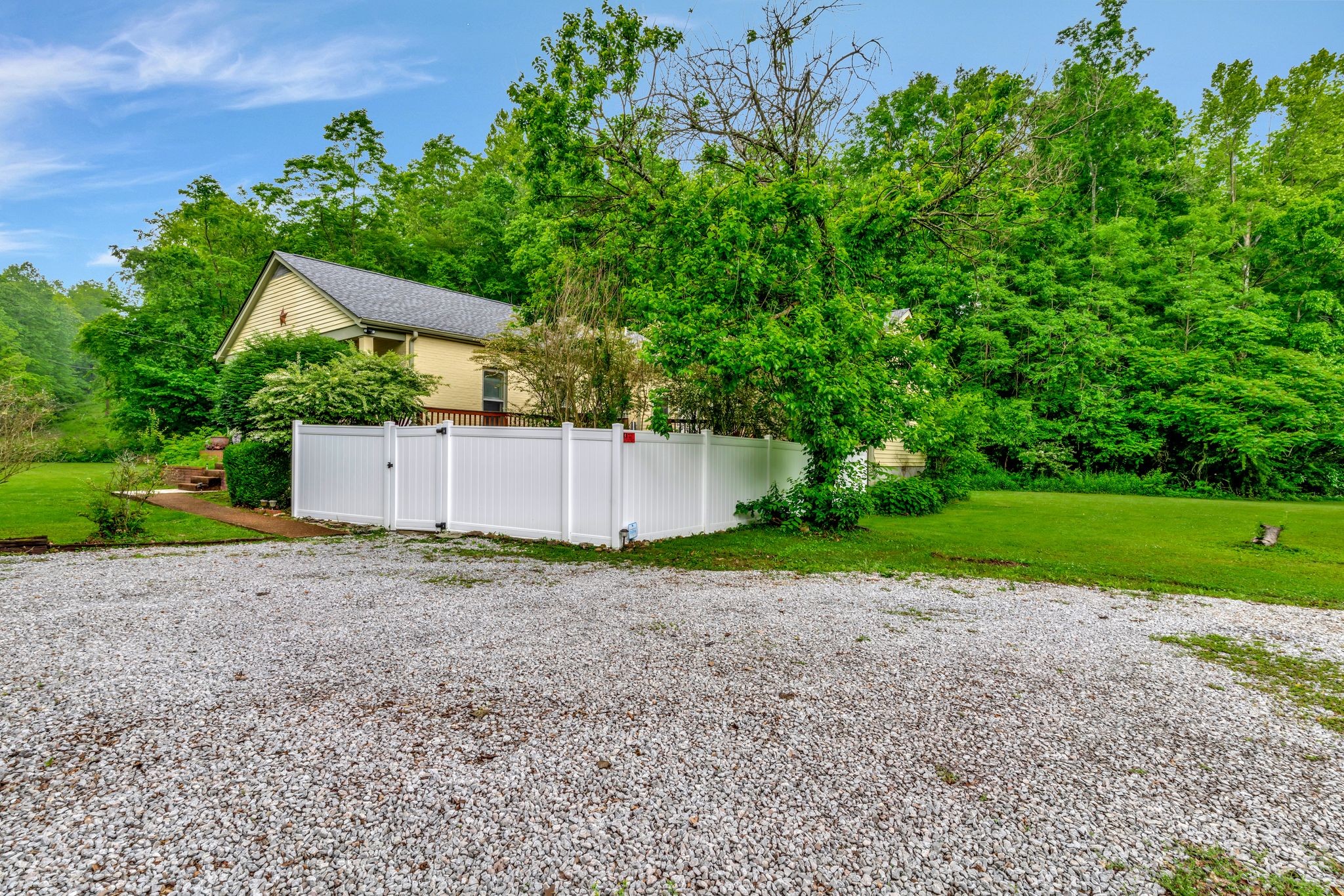 1005 Les Brown Road Bethpage, TN 37022 - Photo 34 of 57 a view of a house with backyard and garden