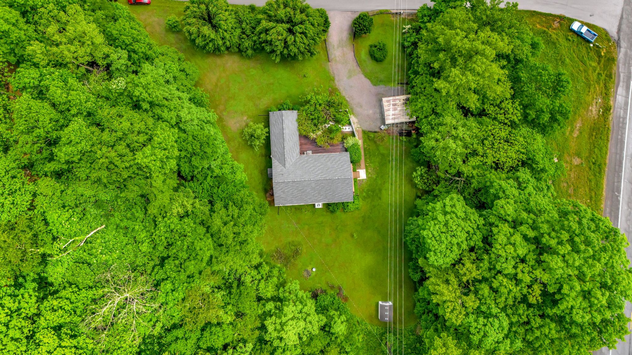 1005 Les Brown Road Bethpage, TN 37022 - Photo 39 of 57 an aerial view of a house with pool yard and outdoor seating