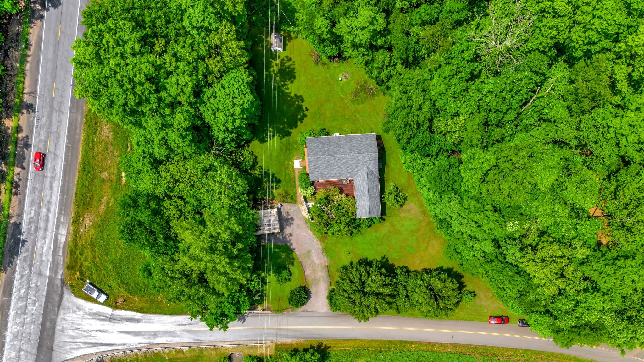 1005 Les Brown Road Bethpage, TN 37022 - Photo 44 of 57 an aerial view of a house with a yard