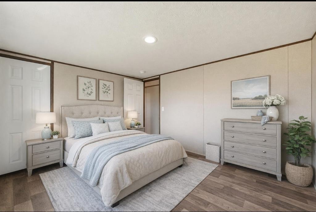618 East 6th Street, Unit B Blum, TX 76627 - Photo 11 of 24 a bedroom with a bed and a cabinets