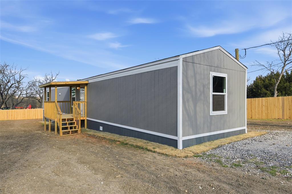 618 East 6th Street, Unit B Blum, TX 76627 - Photo 2 of 24 a view of an outdoor space with porch