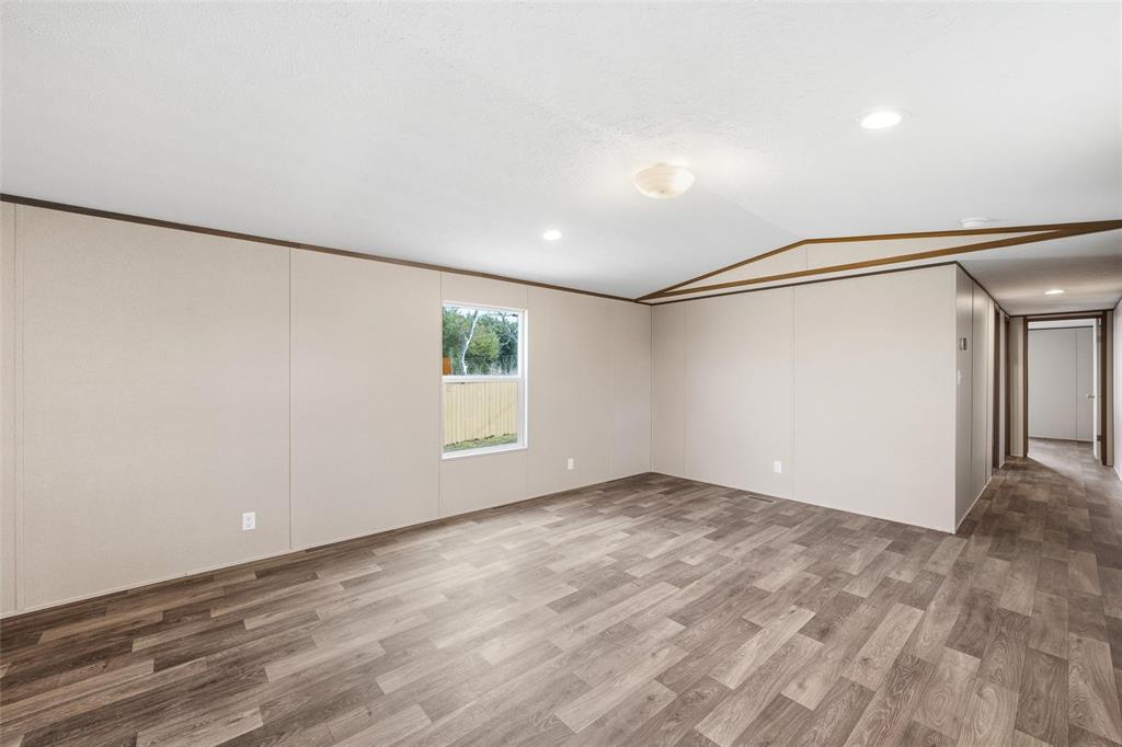 618 East 6th Street, Unit B Blum, TX 76627 - Photo 5 of 24 a view of an empty room with a window