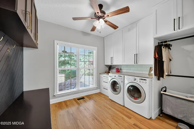 a utility room with dryer and washer