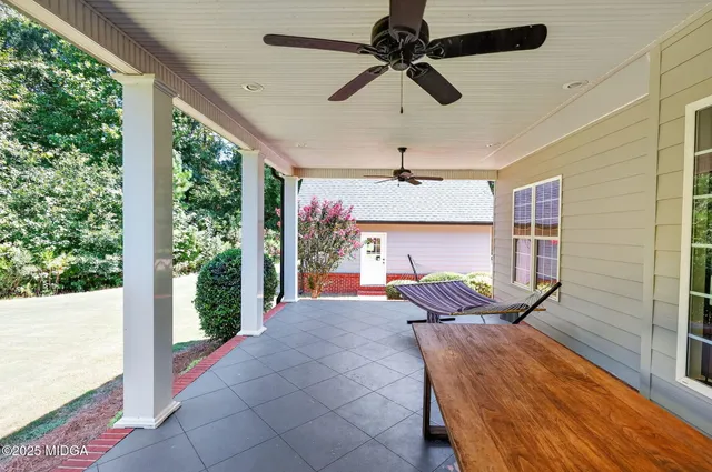 a front view of a house with a porch