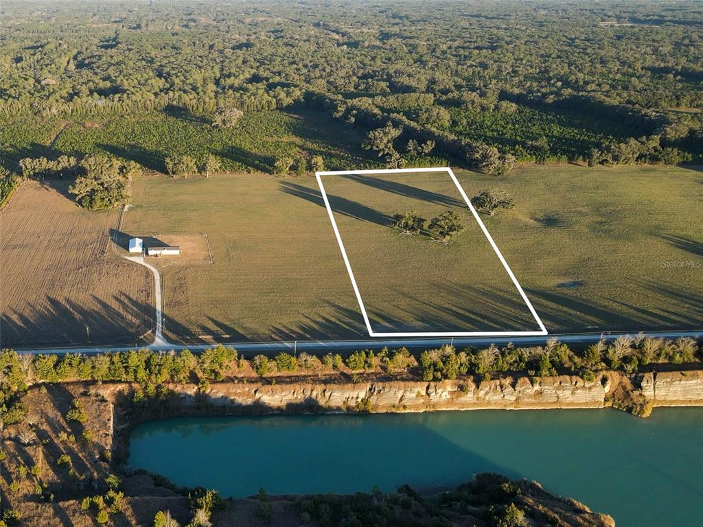 a view of a water with a large mountain view