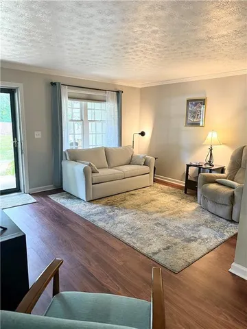 a living room with furniture and a couch