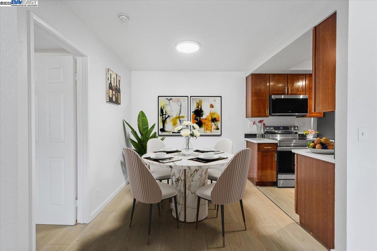 1318 B Street, Unit 314 Hayward, CA 94541 - Photo 12 of 20 a view of a dining room with furniture