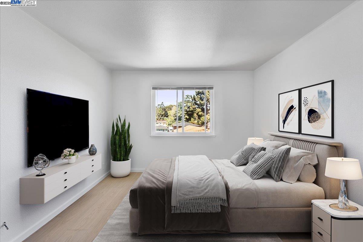 1318 B Street, Unit 314 Hayward, CA 94541 - Photo 13 of 20 a living room with furniture and a flat screen tv