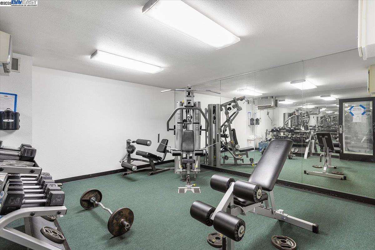 1318 B Street, Unit 314 Hayward, CA 94541 - Photo 18 of 20 a view of a room with gym equipment