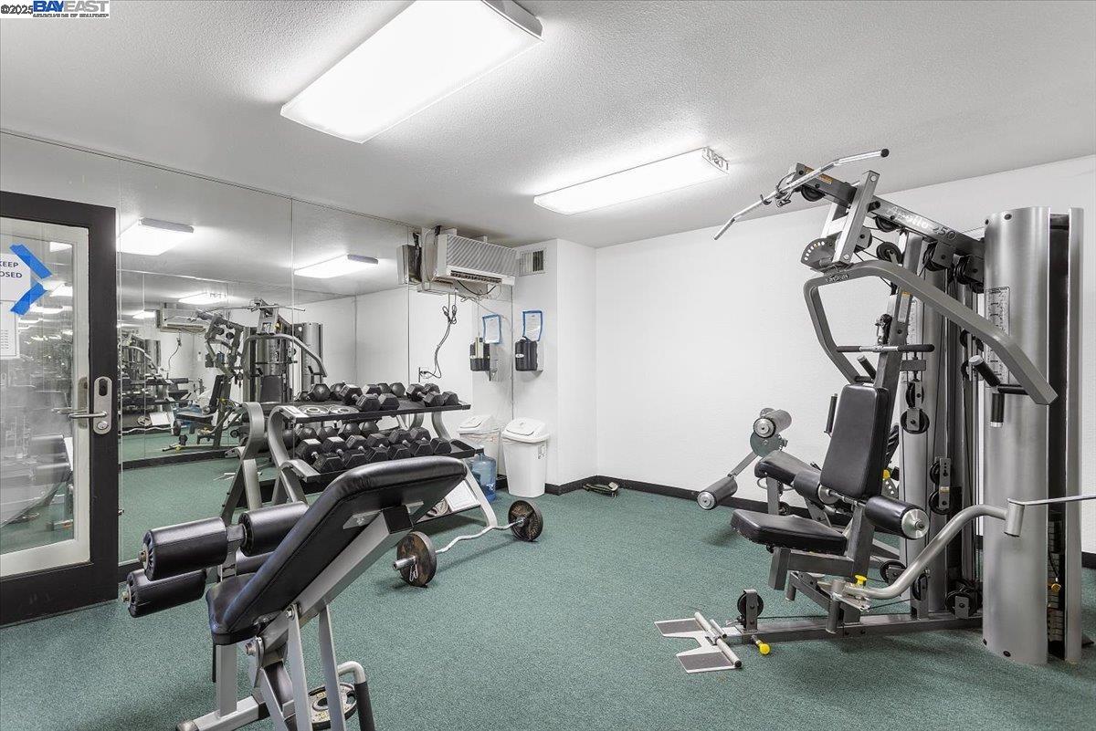1318 B Street, Unit 314 Hayward, CA 94541 - Photo 19 of 20 a view of a room with gym equipment