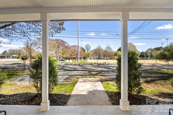 a view of a back yard from a room