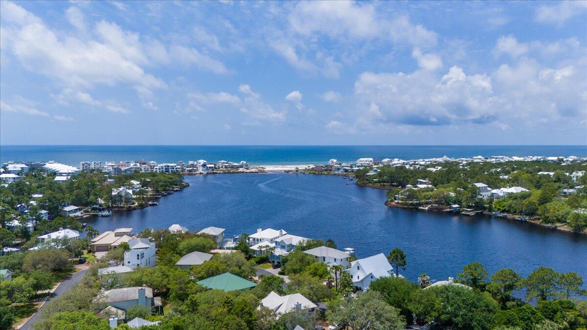 34 Heron's Watch Way, Unit 1203 Santa Rosa Beach, FL 32459 - Photo 14 of 16 an aerial view of a houses with yard
