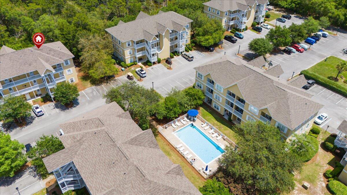 34 Heron's Watch Way, Unit 1203 Santa Rosa Beach, FL 32459 - Photo 2 of 16 an aerial view of a house with a yard and garden
