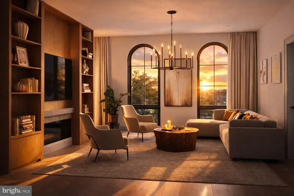a living room with furniture and large windows