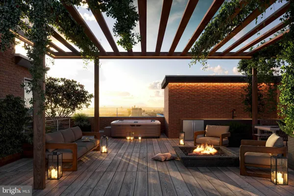 a outdoor living space with patio furniture and wooden floor