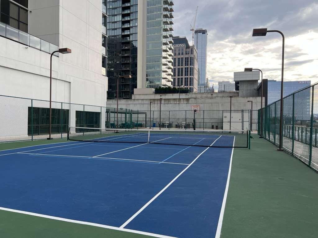 1280 West Peachtree Street Northwest, Unit 1113 Atlanta, GA 30309 - Photo 13 of 16 a view of a tennis court