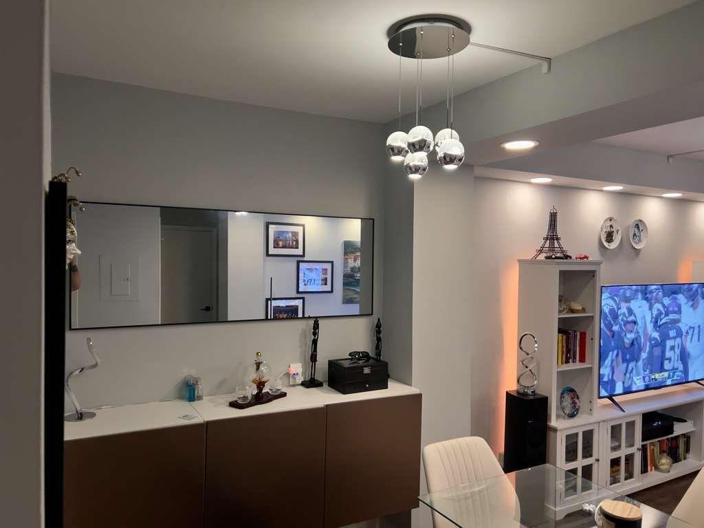 1280 West Peachtree Street Northwest, Unit 1113 Atlanta, GA 30309 - Photo 4 of 16 a bathroom with a sink and a mirror