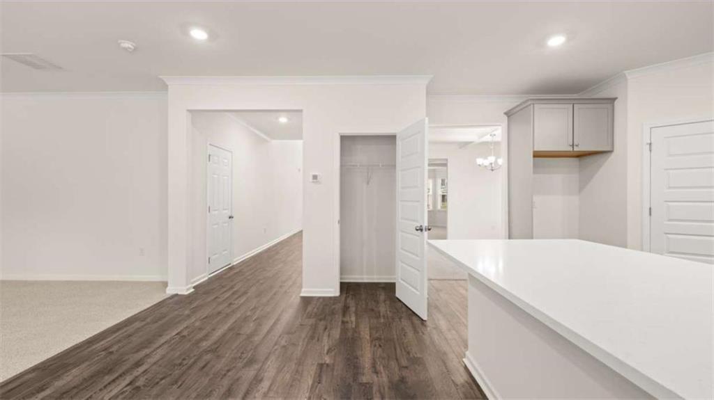 13593 Whitman Lane Covington, GA 30014 - Photo 19 of 25 a view of hallway with wooden floor