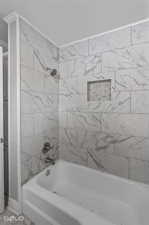 a bathroom with a bathtub