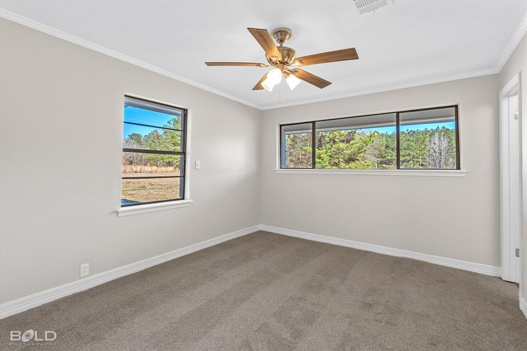 119 Stateny Lane Grand Cane, LA 71032 - Photo 20 of 40 a view of an empty room with a window