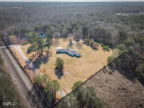 a view of a backyard of a house