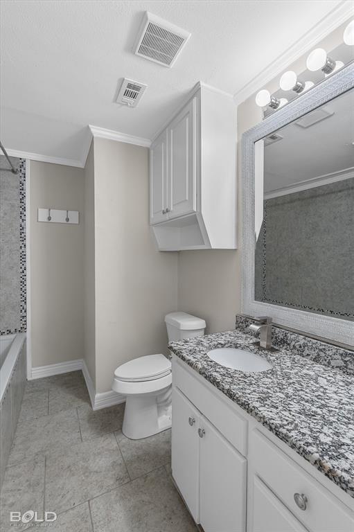 119 Stateny Lane Grand Cane, LA 71032 - Photo 22 of 40 a bathroom with a granite countertop sink a toilet and a mirror