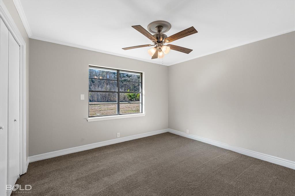 119 Stateny Lane Grand Cane, LA 71032 - Photo 25 of 40 wooden floor in an empty room with a window