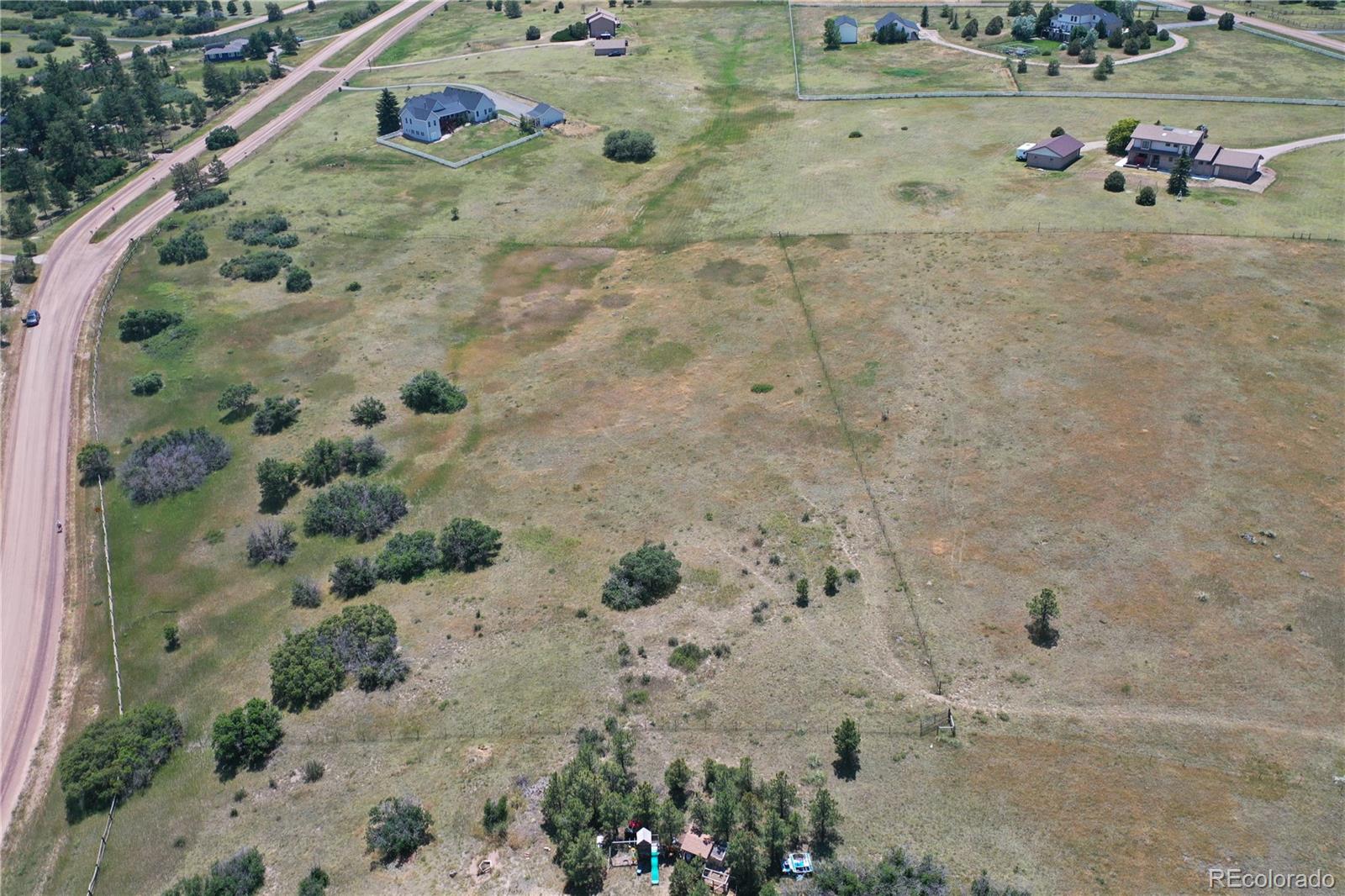 1579 Deerpath Road Franktown, CO 80116 - Photo 45 of 49 a view of a wooden floor