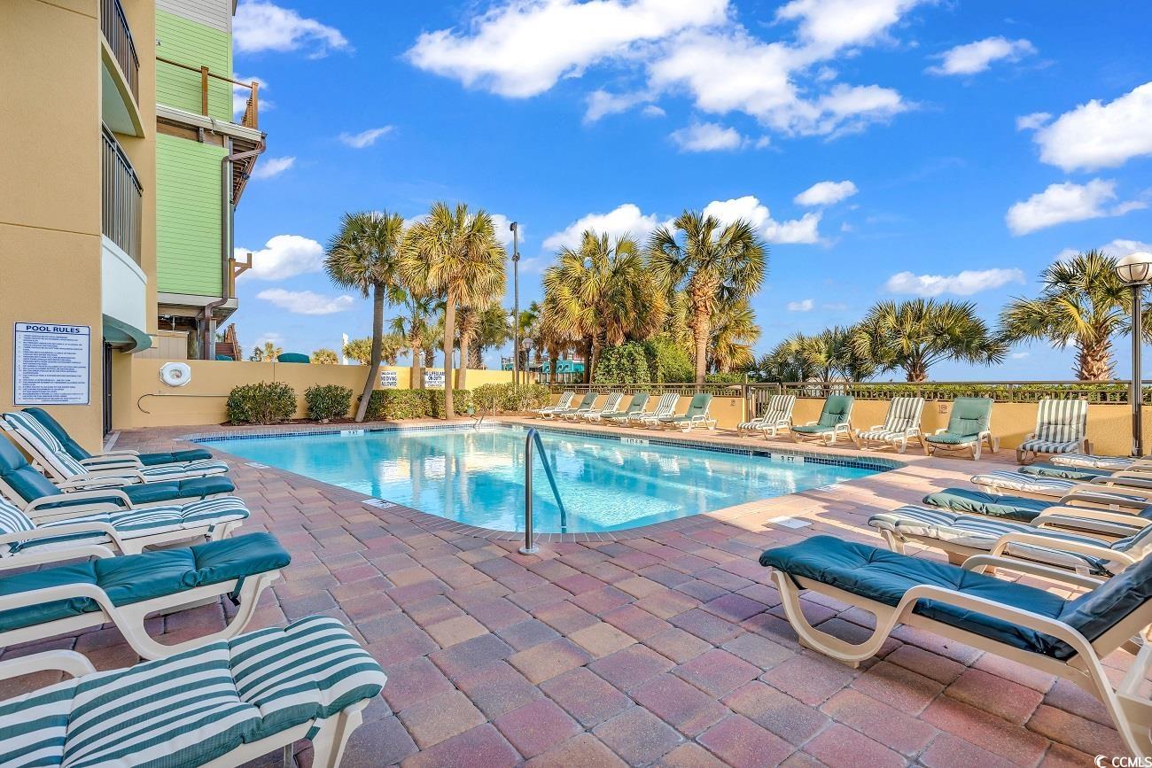 1202 North Ocean Boulevard, Unit 310 Myrtle Beach, SC 29577 - Photo 15 of 29 Community pool with a patio