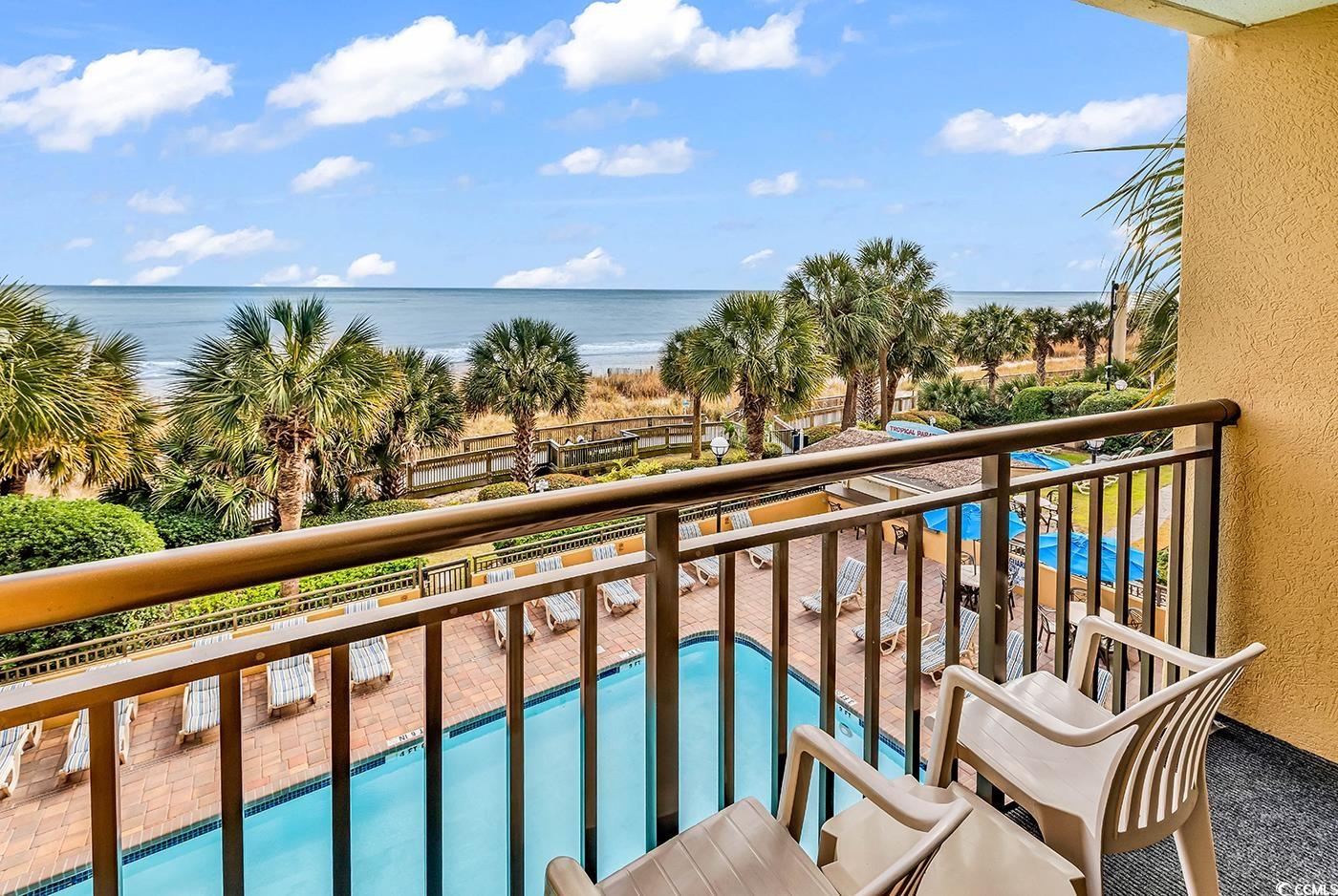 1202 North Ocean Boulevard, Unit 310 Myrtle Beach, SC 29577 - Photo 3 of 29 Balcony with view of pool and a water view