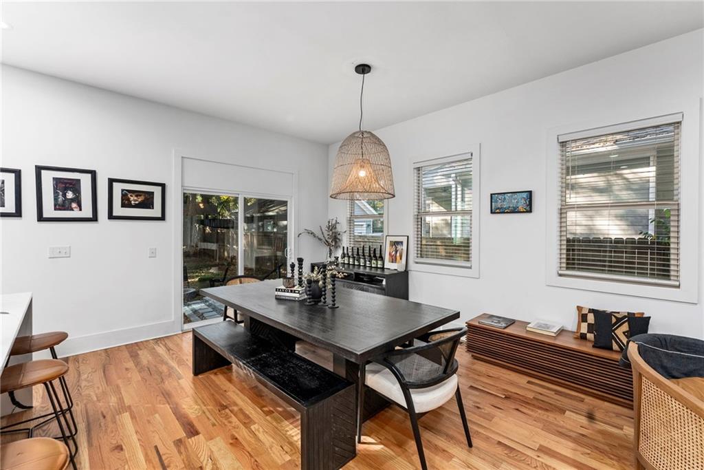 210 Locust Street Northeast Atlanta, GA 30317 - Photo 18 of 54 a view of a dining room with furniture window and wooden floor
