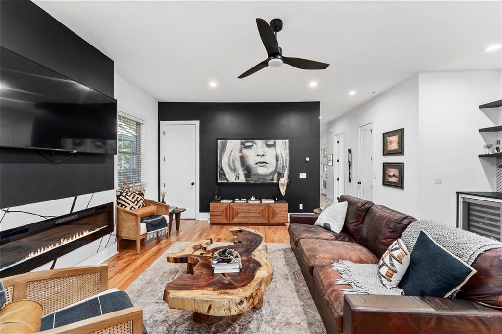 210 Locust Street Northeast Atlanta, GA 30317 - Photo 19 of 54 a living room with furniture and a flat screen tv
